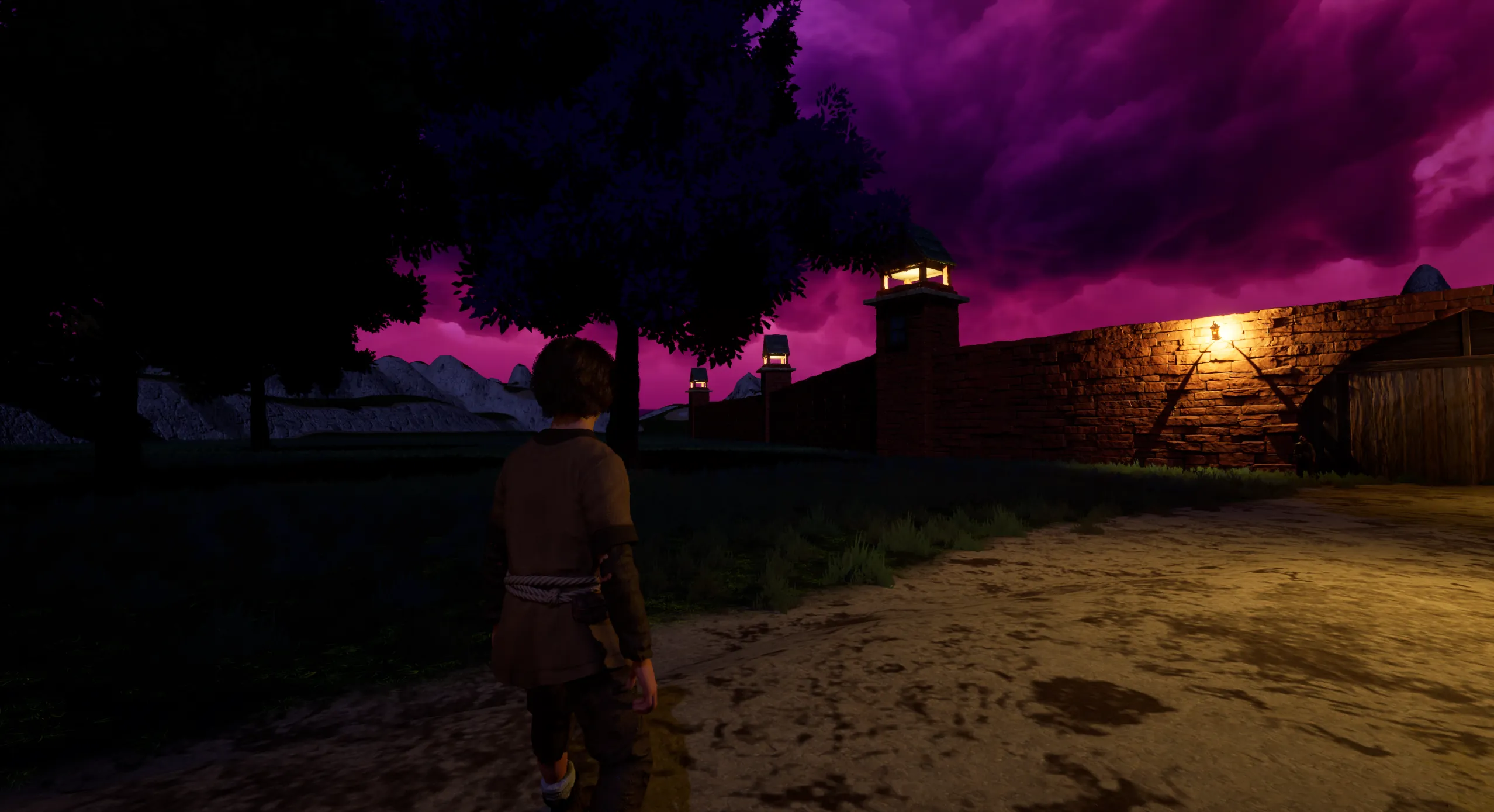 Lantern-topped towers line the brick wall of the town at dusk